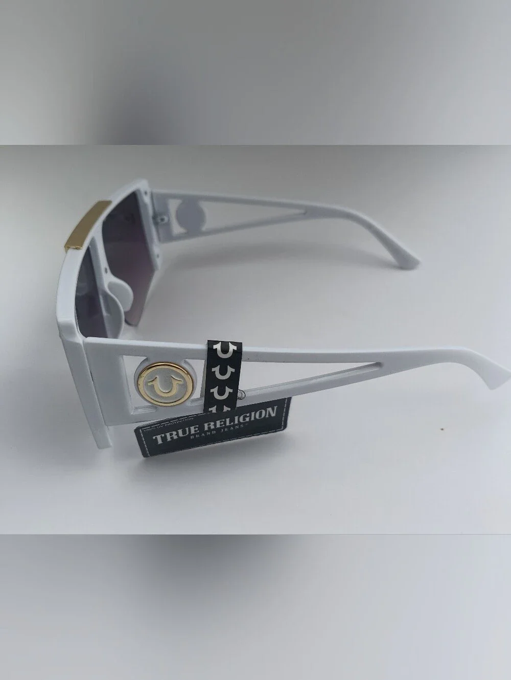 True Religion White Shield Sunglasses with Gold Accent and Purple Gradient Lens